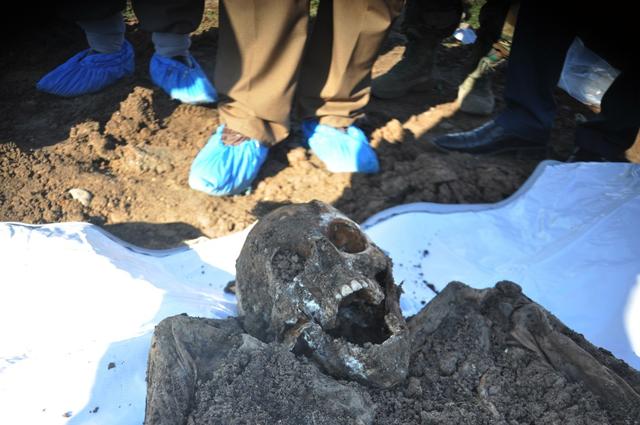 This photo released by the the Mass Graves Directorate of the Kurdish Regional Government shows a skeleton exhumed from a mass grave containing Yazidis killed by Islamic State militants in the Sinjar region of northern Iraq. (AP Photo) This photo released by the the Mass Graves Directorate of the Kurdish Regional Government shows a skeleton exhumed from a mass grave containing Yazidis killed by Islamic State militants in the Sinjar region of northern Iraq. (AP Photo)