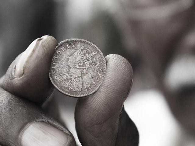 An example of a coin from the reign of British India with the crowned bust of Queen Victoria from the 1800s when they were widely circulated. (Virendra Singh Gosain/HT PHOTO) An example of a coin from the reign of British India with the crowned bust of Queen Victoria from the 1800s when they were widely circulated. (Virendra Singh Gosain/HT PHOTO)