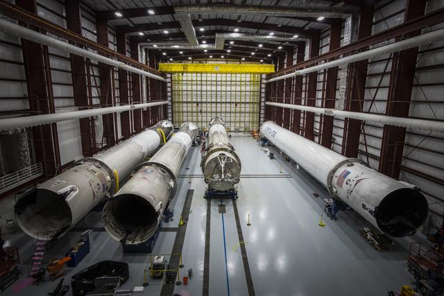 This June 6, 2016 photo made available by SpaceX shows recovered Falcon rocket boosters in a hangar at the Kennedy Space Centre on Merritt Island. (AP)