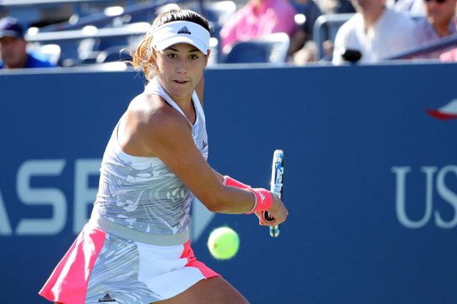 Garbine Muguruza of Spain returns a shot to Elise Mertens of Belgium. (AFP Photo) Garbine Muguruza of Spain returns a shot to Elise Mertens of Belgium. (AFP Photo)