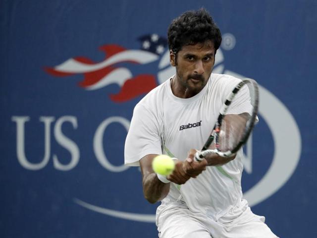 Saketh Myneni, of India, returns a shot to Jiri Vesely, of the Czech Republic. (AP photo) 