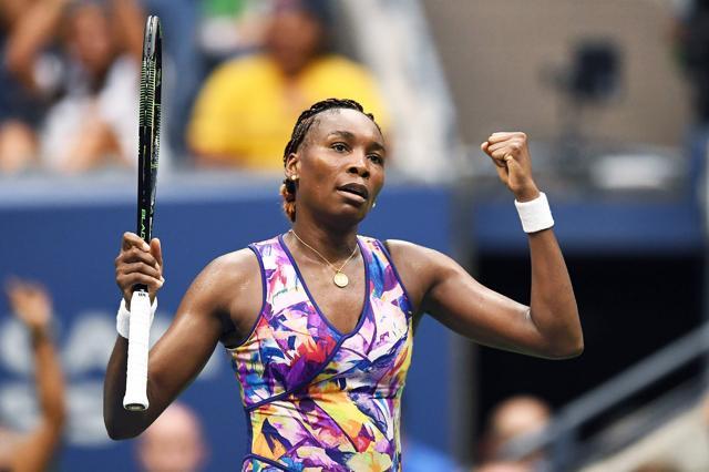 Venus Williams of the US celebrates defeating Kateryna Kozlova of Ukraine. (AFP Photo)