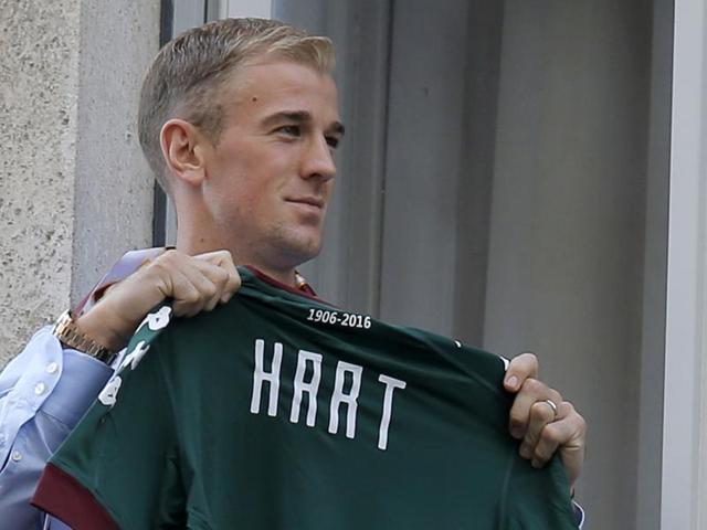 Joe Hart and Samir Nasri after the Premier League win over West Ham. Hart was loaned to Italian club Torino for the rest of the season after dropping to third choice at City behind new signing Claudio Bravo and Willy Caballero(REUTERS)