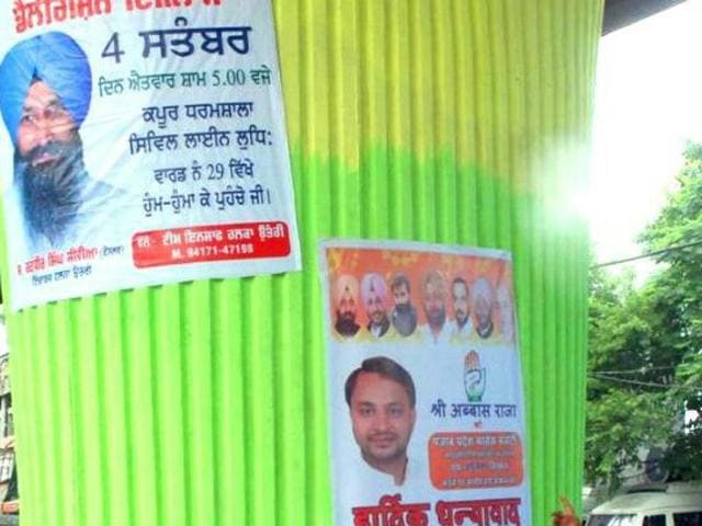 Banners of various political parties defacing graffiti in Ludhiana. (HT Photo) Banners of various political parties defacing graffiti in Ludhiana. (HT Photo)