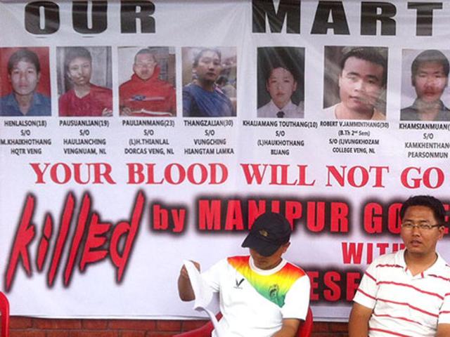 A poster with photographs of the nine dead in police firing at Churachandpur, Manipur, on August 31, 2015(HT) A poster with photographs of the nine dead in police firing at Churachandpur, Manipur, on August 31, 2015(HT)