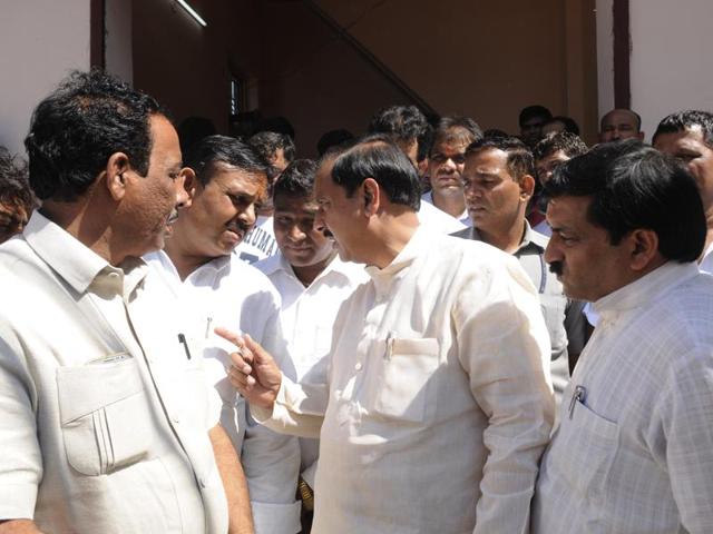 Noida, India - August 27, 2016: Union Minister Mahesh Sharma visited Sarfabad village after the wake of recent cases of fever related deaths in the village, in Noida, India, on Saturday, August 27, 2016. Union minister asks administration to boost health care in the village. (Photo by Burhaan Kinu / Hindustan Times)(Hindustan Times)