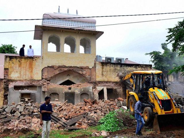 JDA workers demolish a structure at the Rajmahal Palace in Jaipur. (PTI File Photo) JDA workers demolish a structure at the Rajmahal Palace in Jaipur. (PTI File Photo)