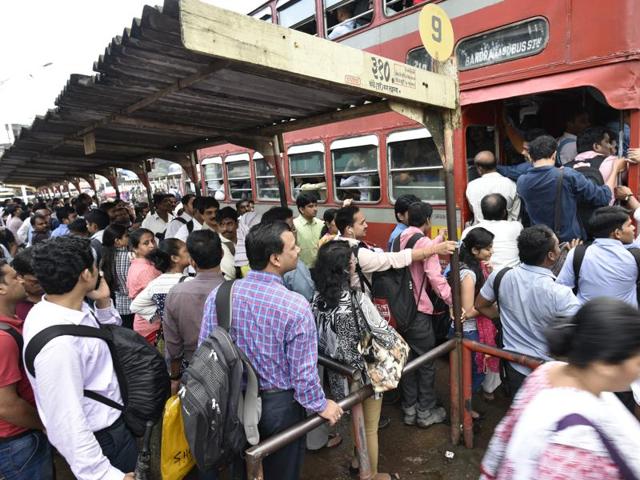 Commuters make a beeline for a BEST bus at Kurla station (West) on Wednesday. (Arijit Sen/HT PHOTO) Commuters make a beeline for a BEST bus at Kurla station (West) on Wednesday. (Arijit Sen/HT PHOTO)