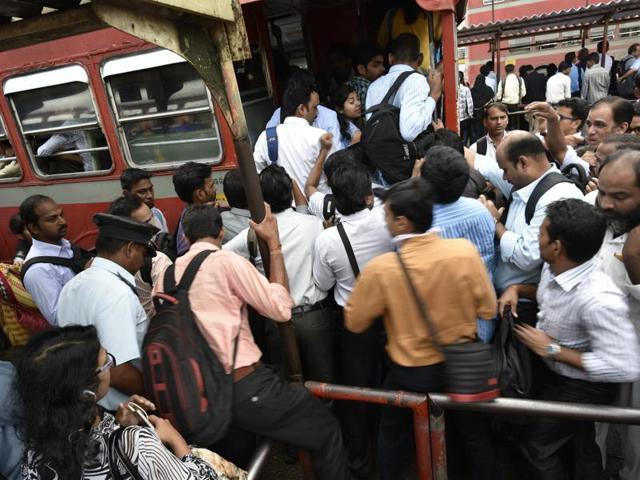 Although the transport department directed MSRTC to operate more buses, but rush due to the strike was huge. People struggle to board a bus at Kurla station. (Arijit Sen/ht photo)