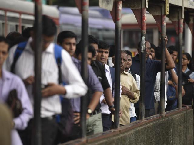 Commuters waiting for a BEST bus at Kurla station as the BEST and MSRTC were directed to operate extra buses on Wednesday. (Arijit Sen/ht photo)