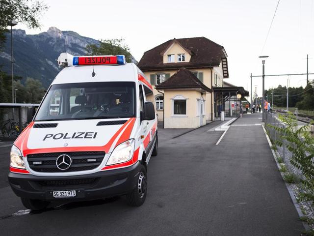 A police car stands at the train station following an attack on board a train in Salez, Switzerland. (AP Photo) A police car stands at the train station following an attack on board a train in Salez, Switzerland. (AP Photo)