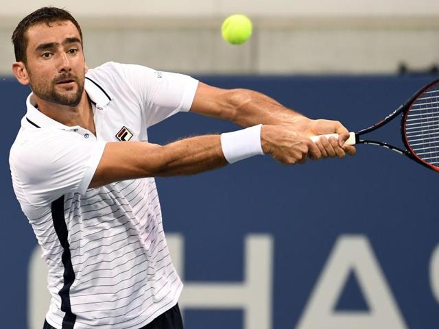 Marin Cilic of Croatia hits a return against Sergiy Stakhovsky of Ukraine. (AFP Photo) Marin Cilic of Croatia hits a return against Sergiy Stakhovsky of Ukraine. (AFP Photo)
