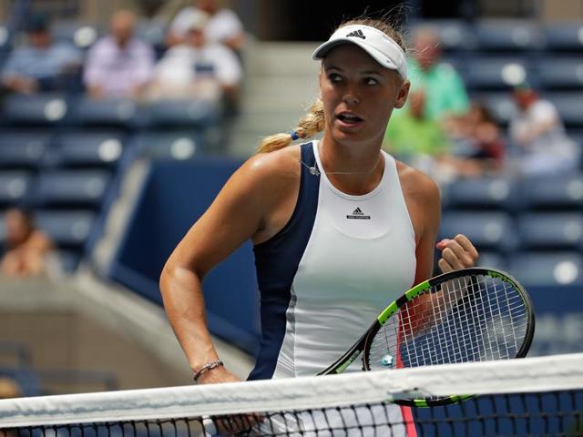 Caroline Wozniacki of Denmark reacts against Svetlana Kuznetsova of Russia. (AFP Photo) Caroline Wozniacki of Denmark reacts against Svetlana Kuznetsova of Russia. (AFP Photo)