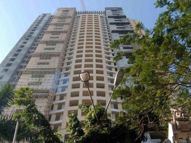 Activist Pravin Wategaonkar claimed that to thank Shivajirao Nilangekar Patil, the then revenue minister, for his help two flats in the scam-hit society were allotted to his son-in-law and his cousin. (HT File Photo) Activist Pravin Wategaonkar claimed that to thank Shivajirao Nilangekar Patil, the then revenue minister, for his help two flats in the scam-hit society were allotted to his son-in-law and his cousin. (HT File Photo)