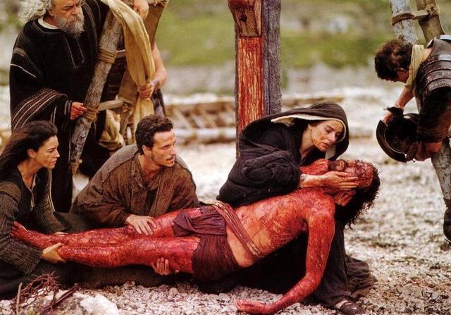 Monica Belucci, Maia Morgenstern and Jim Caviezel in a still from The Passion of The Christ. Monica Belucci, Maia Morgenstern and Jim Caviezel in a still from The Passion of The Christ.