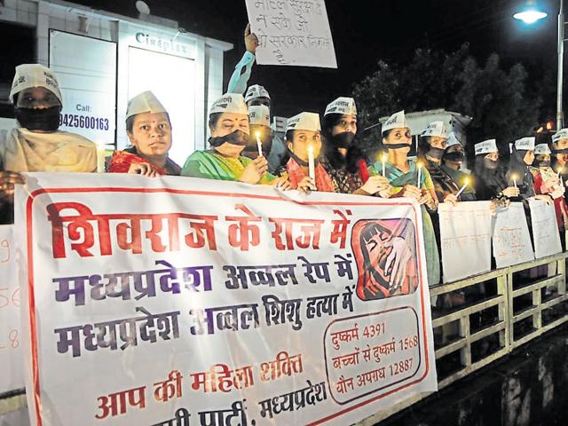 Aam Aadmi Party women-wing activists hold a candlelight march protesting against rising number of crimes against women in the state, on Wednesday in Bhopal. (Mujeeb Faruqui/ HT photo) Aam Aadmi Party women-wing activists hold a candlelight march protesting against rising number of crimes against women in the state, on Wednesday in Bhopal. (Mujeeb Faruqui/ HT photo)