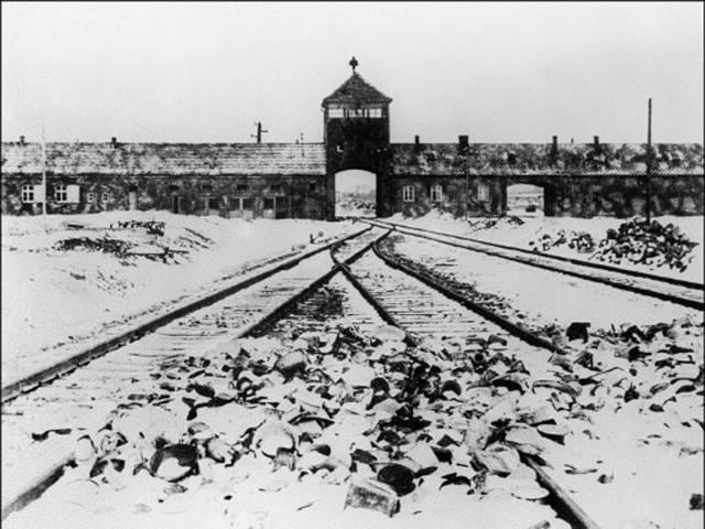 A picture taken in January 1945 depicts Auschwitz concentration camp gate and railways after its liberation by Soviet troops. (AFP Archive)