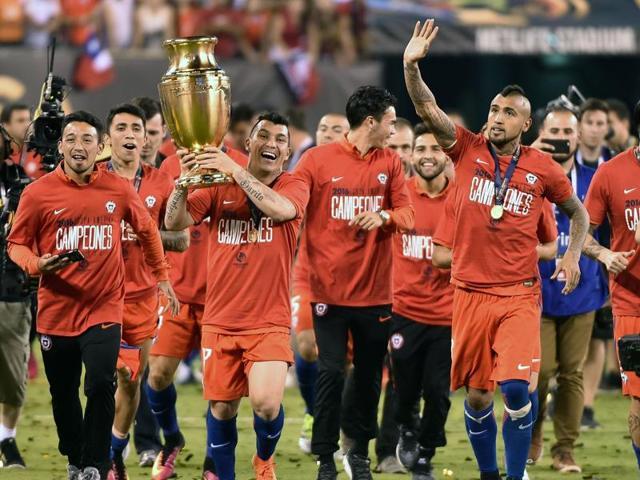 Still riding high on their successive Copa America wins, Arturo Vidal, right, insisted Claudio Bravo’s absence will not be a big blow to Chile. (AFP) Still riding high on their successive Copa America wins, Arturo Vidal, right, insisted Claudio Bravo’s absence will not be a big blow to Chile. (AFP)