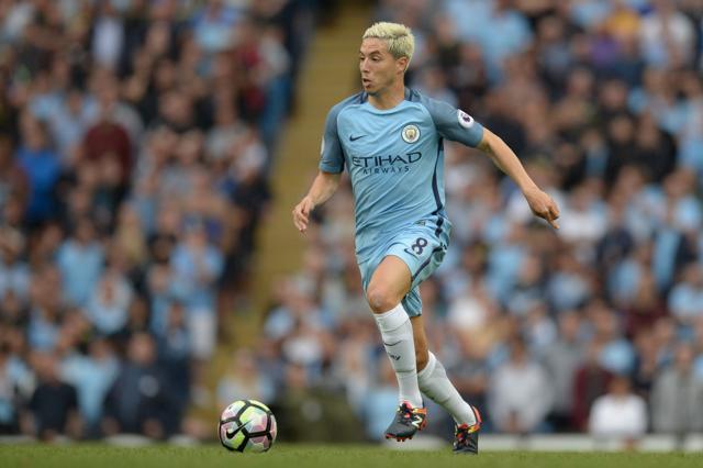 Manchester City's French midfielder Samir Nasri dribbling the ball. (AFP Photo)
