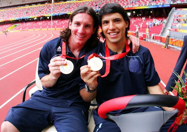 Messi and Sergio Aguero pose with their gold medals after Argentina defeated Nigeria to win gold at the 2008 Beijing Olympics. (Getty Images) Messi and Sergio Aguero pose with their gold medals after Argentina defeated Nigeria to win gold at the 2008 Beijing Olympics. (Getty Images)