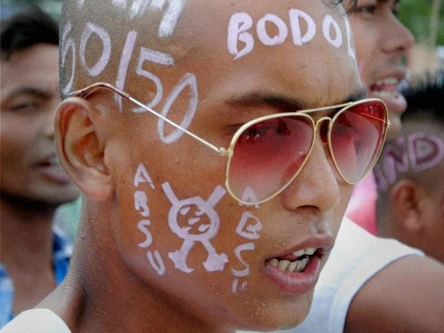 Activists of All Bodo Student's Union (ABSU), National Democratic Front of Bodoland-Progressive (NDFB-P) and People's Joint Action Committee for Bodoland Movement (PJACBM) shout slogans while blocking the National highway 31 to demand the creation of a separate state(PTI)