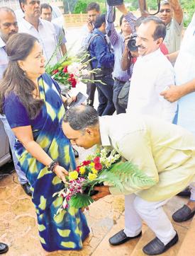 A BJP legislator welcomes Rajasthan chief minister Vasundhara Raje at the state assembly in Jaipur on Thursday. (PTI Photo) A BJP legislator welcomes Rajasthan chief minister Vasundhara Raje at the state assembly in Jaipur on Thursday. (PTI Photo)