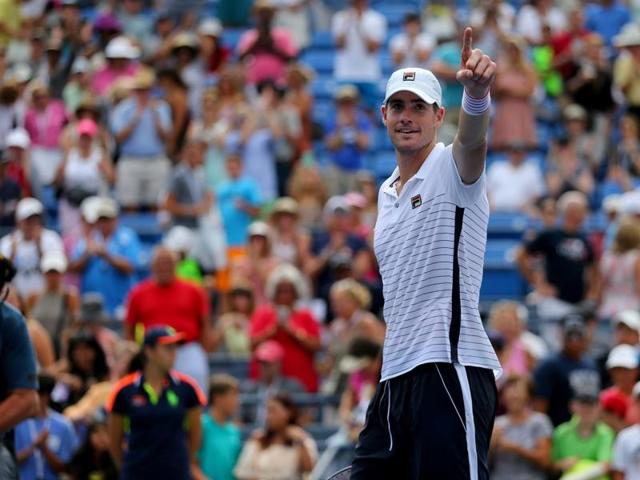 John Isner of the United States gestures to his fan section after defeating Steve Darcis. (USA Today Sports) John Isner of the United States gestures to his fan section after defeating Steve Darcis. (USA Today Sports)