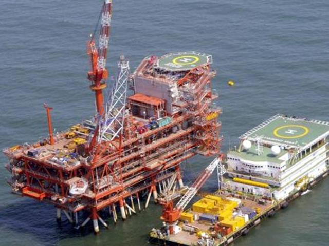 Reliance Industries KG-D6's control and raiser platform is seen off the Bay of Bengal in this undated handout photo. (Reuters File Photo) Reliance Industries KG-D6's control and raiser platform is seen off the Bay of Bengal in this undated handout photo. (Reuters File Photo)