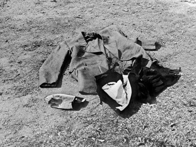 A picture released in London on January 2, 1948, shows German Chancellor Adolf Hitler's teared and blood stained uniform worn by the dictator on the day German officers attempted to kill him in a bomb attack in June 1944. The picture was taken just before the uniform was secretly burnt in the presence of top Allied Army officers in 1947. The suit was destroyed so that it never became a Nazi cult object. The time and place of the suit burning were also kept secret to avoid it from becoming a Nazi pilgrimage destination. (AFP Archive)