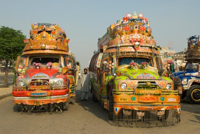 Colourfully painted buses and trucks in Lahore (Getty Images) Colourfully painted buses and trucks in Lahore (Getty Images)