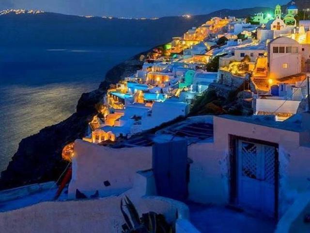 The ongoing migrant and economic crises in Greece have done little to deter visitors from descending on the Mediterranean paradise. Santorini by the night... (webgreece/instagram) 