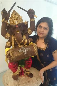 Rintu Rathod with the 5-feet-tall chocolate Ganesha idol she made. (HT Photo) Rintu Rathod with the 5-feet-tall chocolate Ganesha idol she made. (HT Photo)