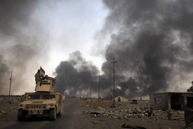 Although the fight is led by Kurdish Peshmerga militias and Iraqi soldiers, like those in this picture, the US role has grown larger and more active. (AP) Although the fight is led by Kurdish Peshmerga militias and Iraqi soldiers, like those in this picture, the US role has grown larger and more active. (AP)