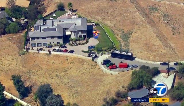 This image shows the home of entertainer Chris Brown with a police vehicle outside in Los Angeles Tuesday on August 30, 32016. (AP)