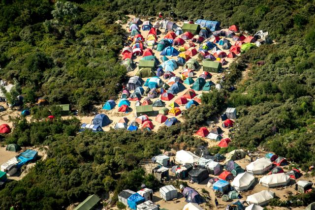 This file photo taken on August 16, 2016 shows an aerial view of tents in the ‘Jungle’ camp in Calais. (AFP) This file photo taken on August 16, 2016 shows an aerial view of tents in the ‘Jungle’ camp in Calais. (AFP)