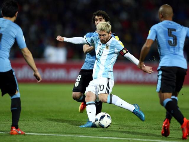 Argentina's Lionel Messi (C) takes a shot. (REUTERS)