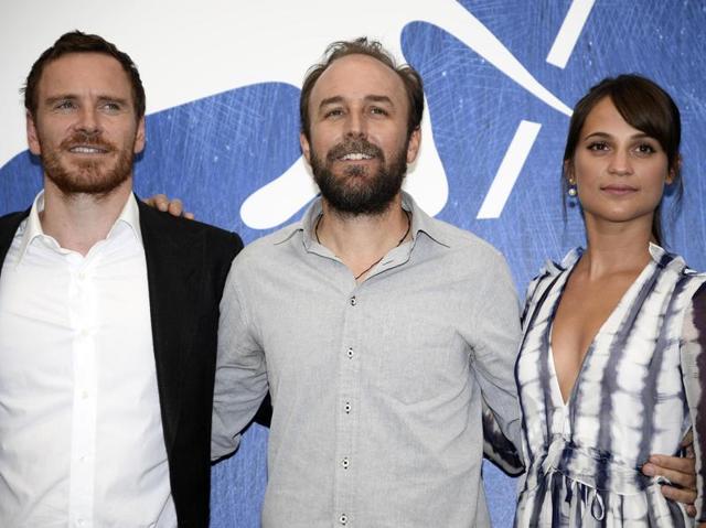 From left, actor Michael Fassbender, director Derek Cianfrance, and actress Alicia Vikander attend a photo call for the movie The Light Between Oceans. (AP) From left, actor Michael Fassbender, director Derek Cianfrance, and actress Alicia Vikander attend a photo call for the movie The Light Between Oceans. (AP)