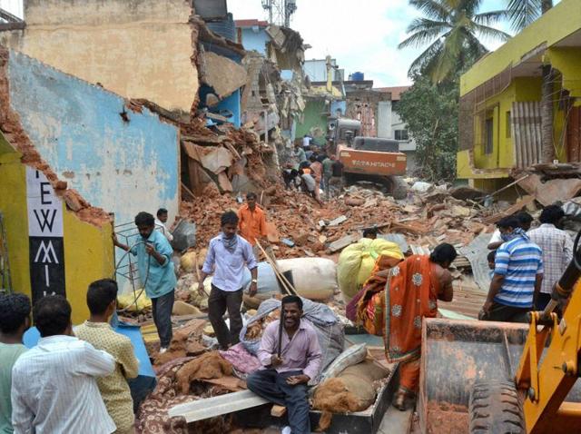 JCB demolished the buildings which was built on encroached land and drainages during a demolition drive by Bruhat Bangalore Mahanagar Palike(BBMP) in Bommansandra area of Bengaluru. (PTI file photo) JCB demolished the buildings which was built on encroached land and drainages during a demolition drive by Bruhat Bangalore Mahanagar Palike(BBMP) in Bommansandra area of Bengaluru. (PTI file photo)