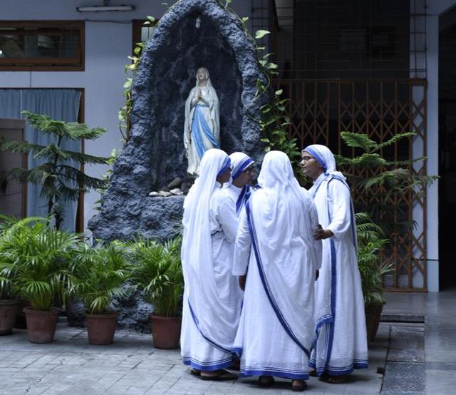 Nuns discuss daily matters in the courtyard of the Mother House in Kolkata. (Samir Jana/HT PHOTO)