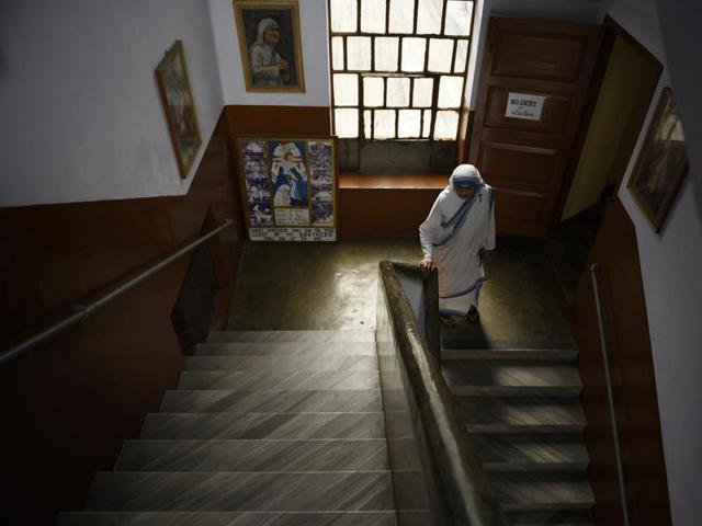 A nun passes through stairs in Nirmala Shishu Bhavan on AJC Bose road. (Samir Jana/HT PHOTO)