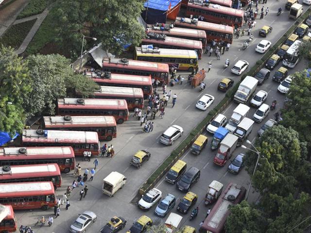 TRAVEL MADE EASY: State transport (ST) buses parked on Senapati Bapat Marg, to ferry devotees to the home towns. (Anshuman Poyrekar/HT ) 