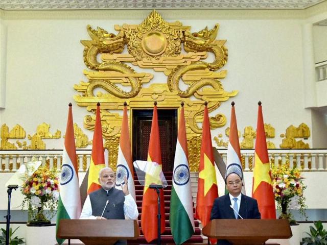 Prime Minister Narendra Modi with his Vietnamese counterpart Nguyen Xuan Phuc during a joint statement in Hanoi, Vietnam on Saturday. (PTI Photo)