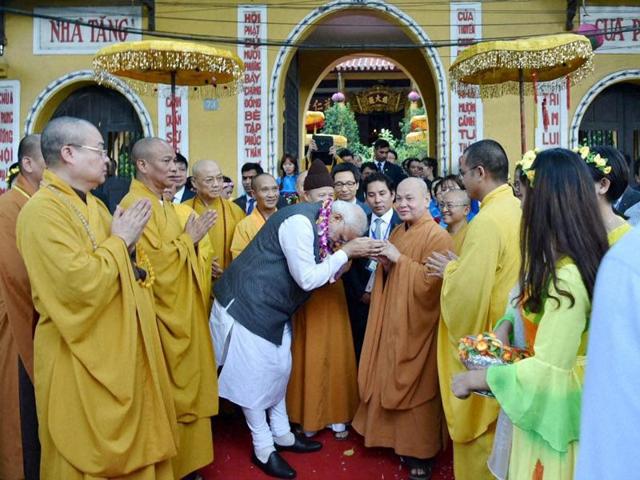 Prime Minister Narendra Modi visiting the Quan Su Pagoda, in Hanoi, Vietnam on Saturday. He invited all the monks to visit India -- the land of Buddha -- and especially to Varanasi “which I represent in the Indian Parliament.” (PTI Photo)