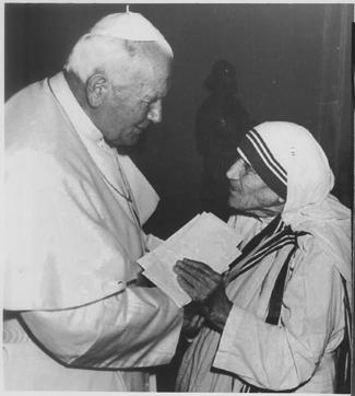Pope John Paul II greets Mother Teresa at the start of a private audience at the Vatican. “She is perhaps the Holy See’s most recognisable personality of the media age, some would say even more well-known and charismatic than her closest friend, Polish-born Pope Saint John Paul II,” says Dr Gezem Alpion. (HT Photo) Pope John Paul II greets Mother Teresa at the start of a private audience at the Vatican. “She is perhaps the Holy See’s most recognisable personality of the media age, some would say even more well-known and charismatic than her closest friend, Polish-born Pope Saint John Paul II,” says Dr Gezem Alpion. (HT Photo)