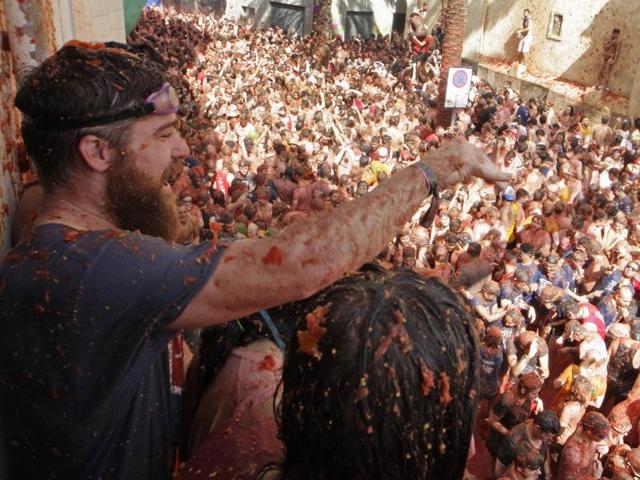 The festival involves throwing and pelting tomatoes as part of a fun fight. It is played purely for entertainment purpose. Revelers make merry... Trucks dumped 160 tons of tomatoes for some 20,000 participants, many from abroad, to throw during the hour-long morning festivities. (AP)