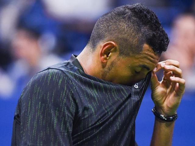 Nick Kyrgios of Australia wipes his face during his loss to Illya Marchenko of Ukraine. Trailing 6-4, 4-6, 1-6, Kyrgios retired with a hip injury. (AFP) Nick Kyrgios of Australia wipes his face during his loss to Illya Marchenko of Ukraine. Trailing 6-4, 4-6, 1-6, Kyrgios retired with a hip injury. (AFP)