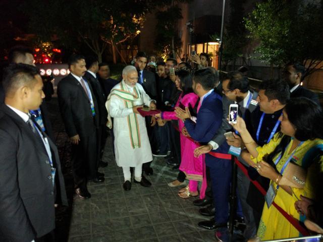 Indian community from Hangzhou welcomes PM Modi at his hotel. (HT Photo) Indian community from Hangzhou welcomes PM Modi at his hotel. (HT Photo)