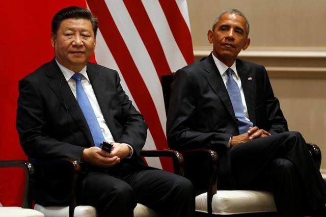 China's President Xi Jinping (L) and US President Barack Obama participate in a Paris Agreements climate event ahead of the G20 Summit, at West Lake State Guest House in Hangzhou, China. (Reuters) China's President Xi Jinping (L) and US President Barack Obama participate in a Paris Agreements climate event ahead of the G20 Summit, at West Lake State Guest House in Hangzhou, China. (Reuters)