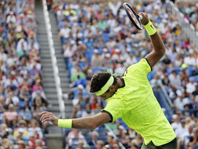 Del Potro reacts after losing a point by smashing his racket. (AP) Del Potro reacts after losing a point by smashing his racket. (AP)
