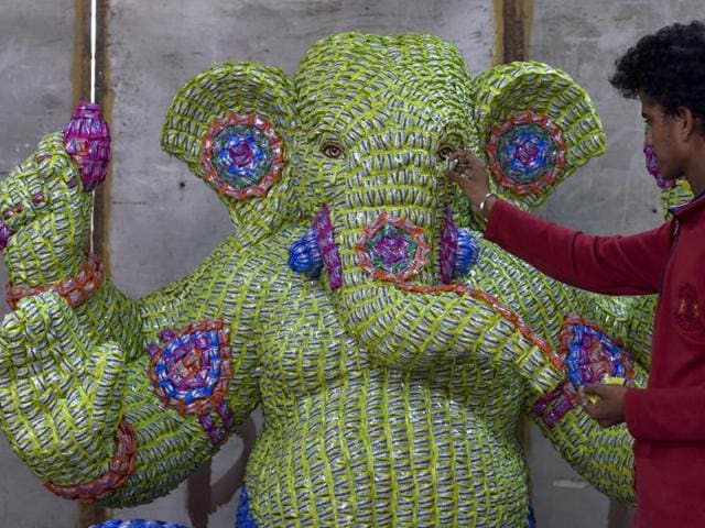 SWEET MEMORIES: A Ganpati idol at Byculla that is made of 11,100 chocolates. (Kunal Patil/ht) SWEET MEMORIES: A Ganpati idol at Byculla that is made of 11,100 chocolates. (Kunal Patil/ht)
